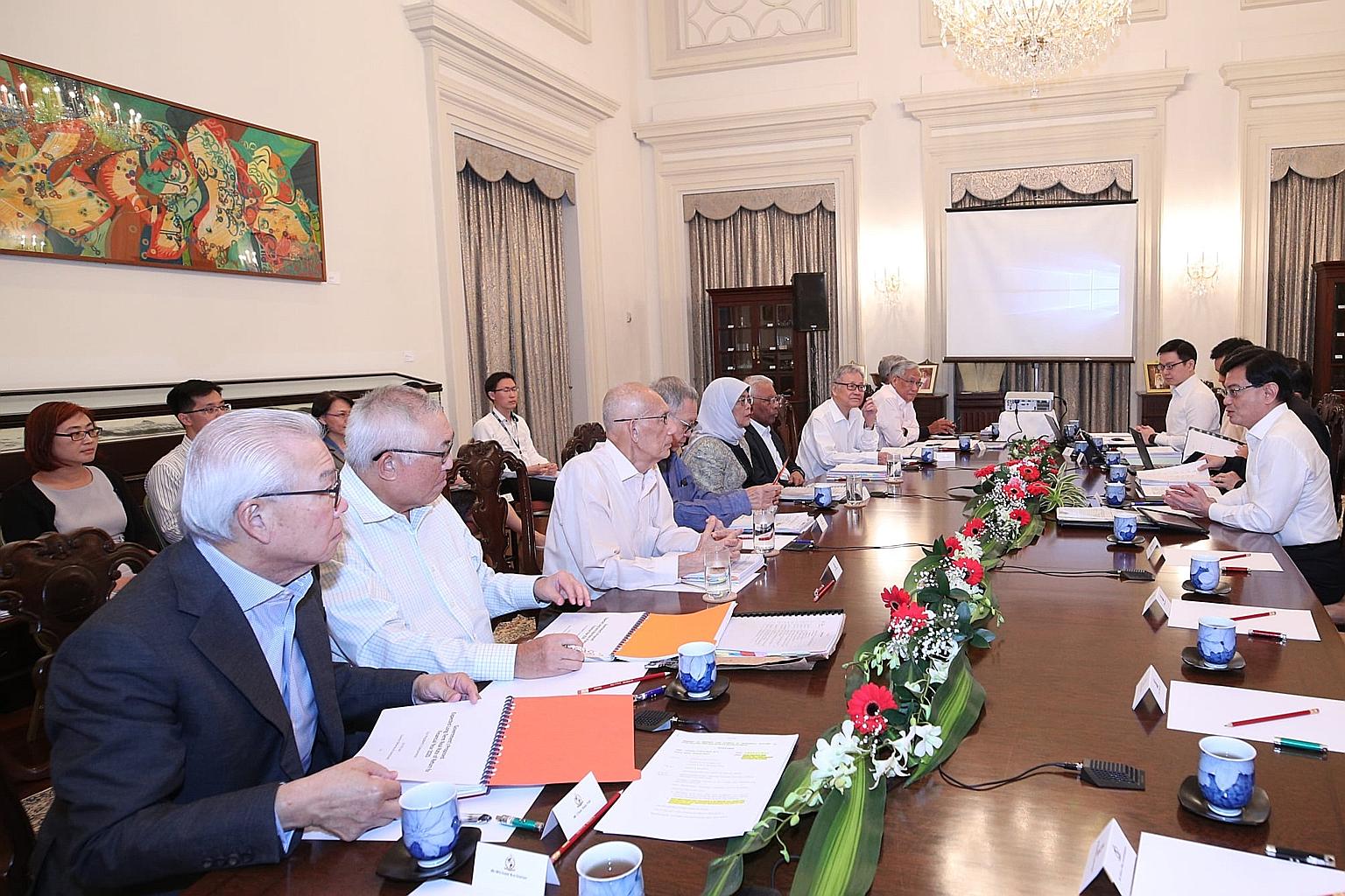 Deputy Prime Minister Heng Swee Keat and officials from the Ministry of Finance briefing President Halimah Yacob and members of the Council of Presidential Advisers in December on expected returns on the reserves. Mr Heng said the President is entitl