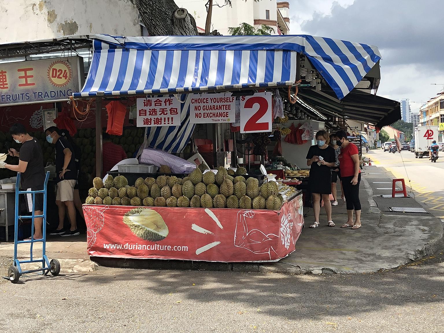Stalls like Durian Culture in Sims Avenue no longer let buyers eat on their premises, which may lead to a drop in the number of customers.