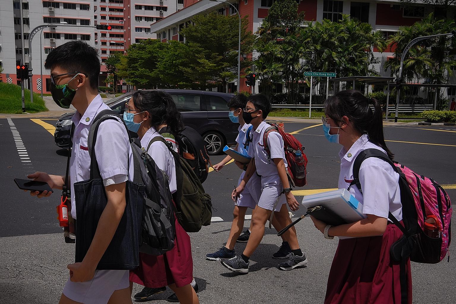 In schools, there were teething issues involving the measures to stem the spread of the coronavirus. Students were not used to wearing masks for a prolonged period of time and schools had to manage congestion at entry points during arrival and dismis