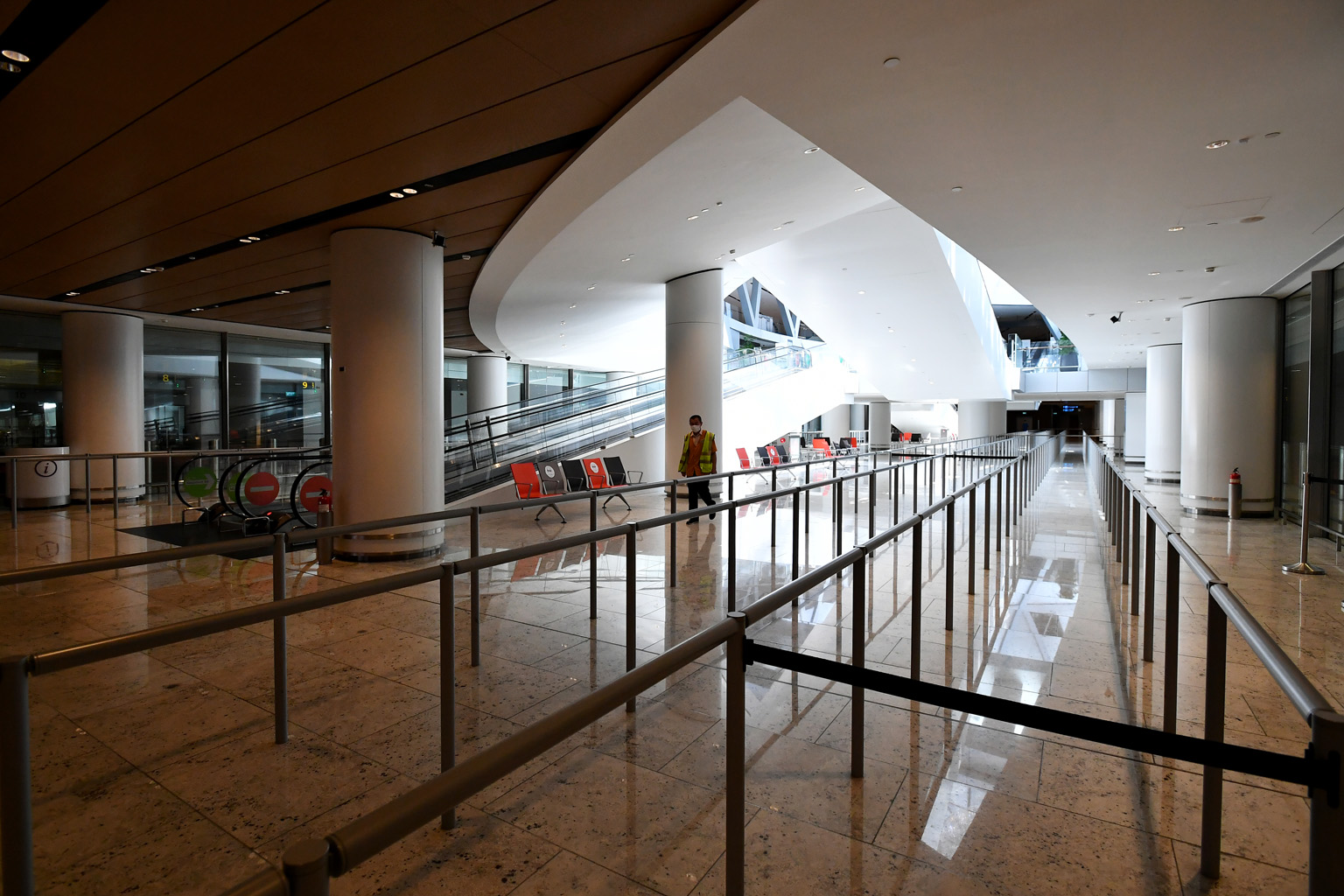 An empty line for taxis at Jewel Changi Airport late last month. Prime Minister Lee Hsien Loong said: "Industries that depend on travel, like aviation, hotels and tourism, will take a long time to get back on their feet, and may never recover fully."