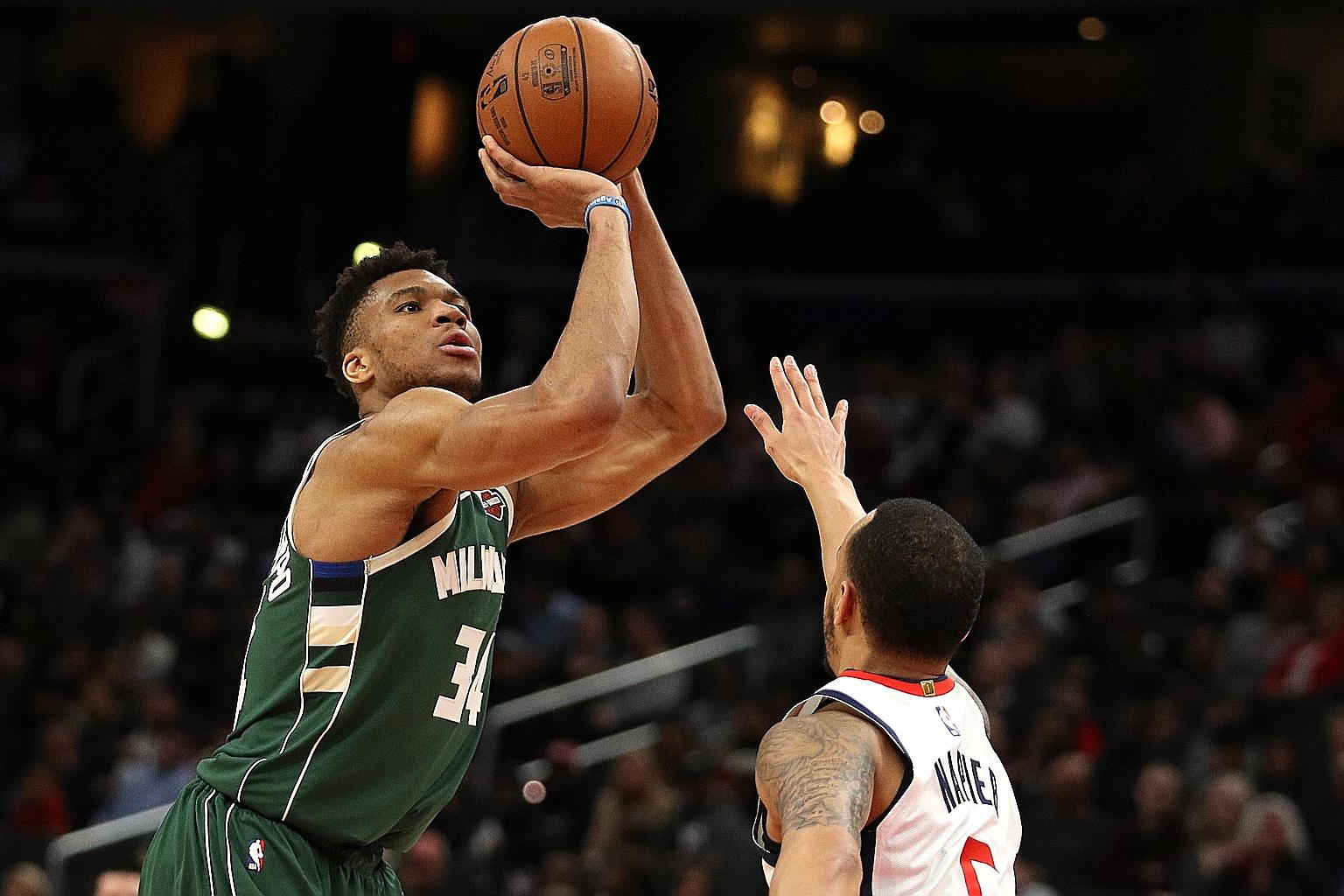 Giannis Antetokounmpo of the Milwaukee Bucks taking a shot against the Washington Wizards at the Capital One Arena on Feb 24 in Washington. The NBA season was suspended on March 11.