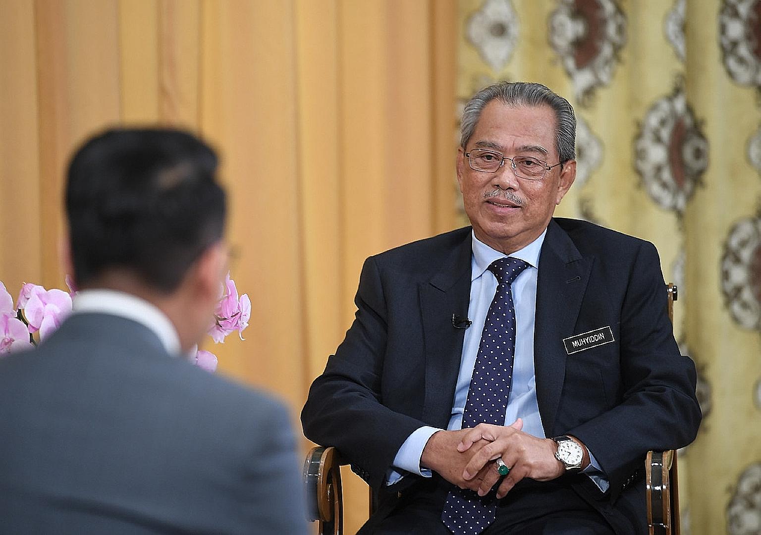 Bersatu sources told The Straits Times that party president and Malaysian Prime Minister Muhyiddin Yassin, seen here giving an interview to Malaysian media in his office in April, made his intentions to call snap elections clear at the Bersatu suprem