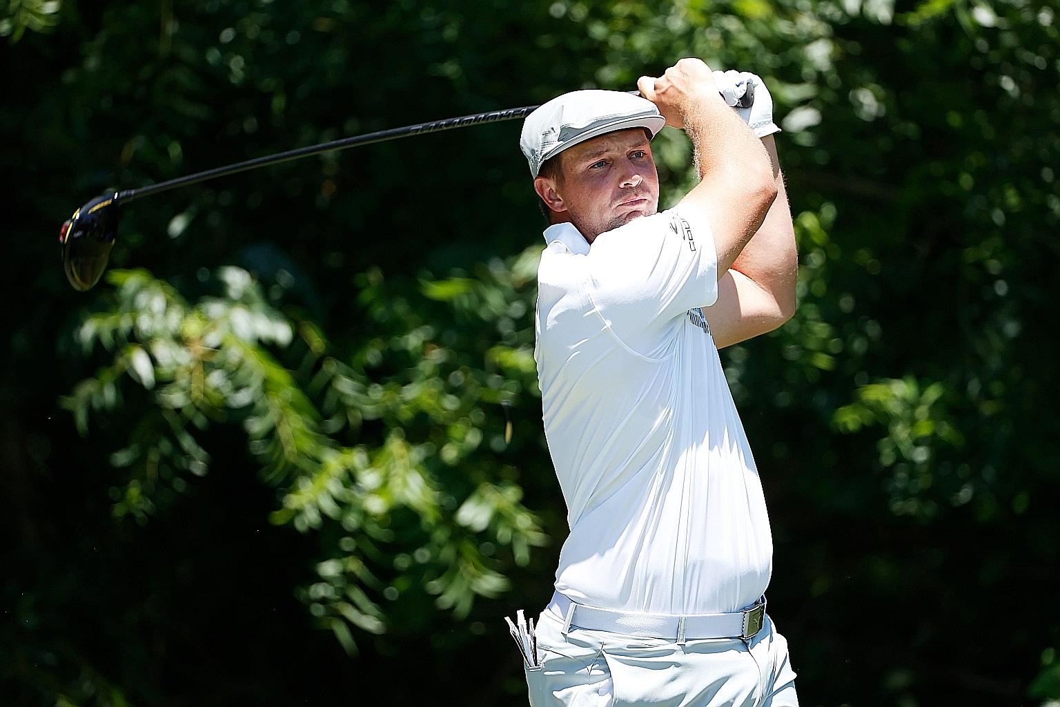 Bryson DeChambeau launching his drive on the sixth tee in Friday's second round of the Charles Schwab Challenge. He had consecutive five-under 65s and was tied second with fellow-American Jordan Spieth on 130, one shot behind leader Harold Varner (66