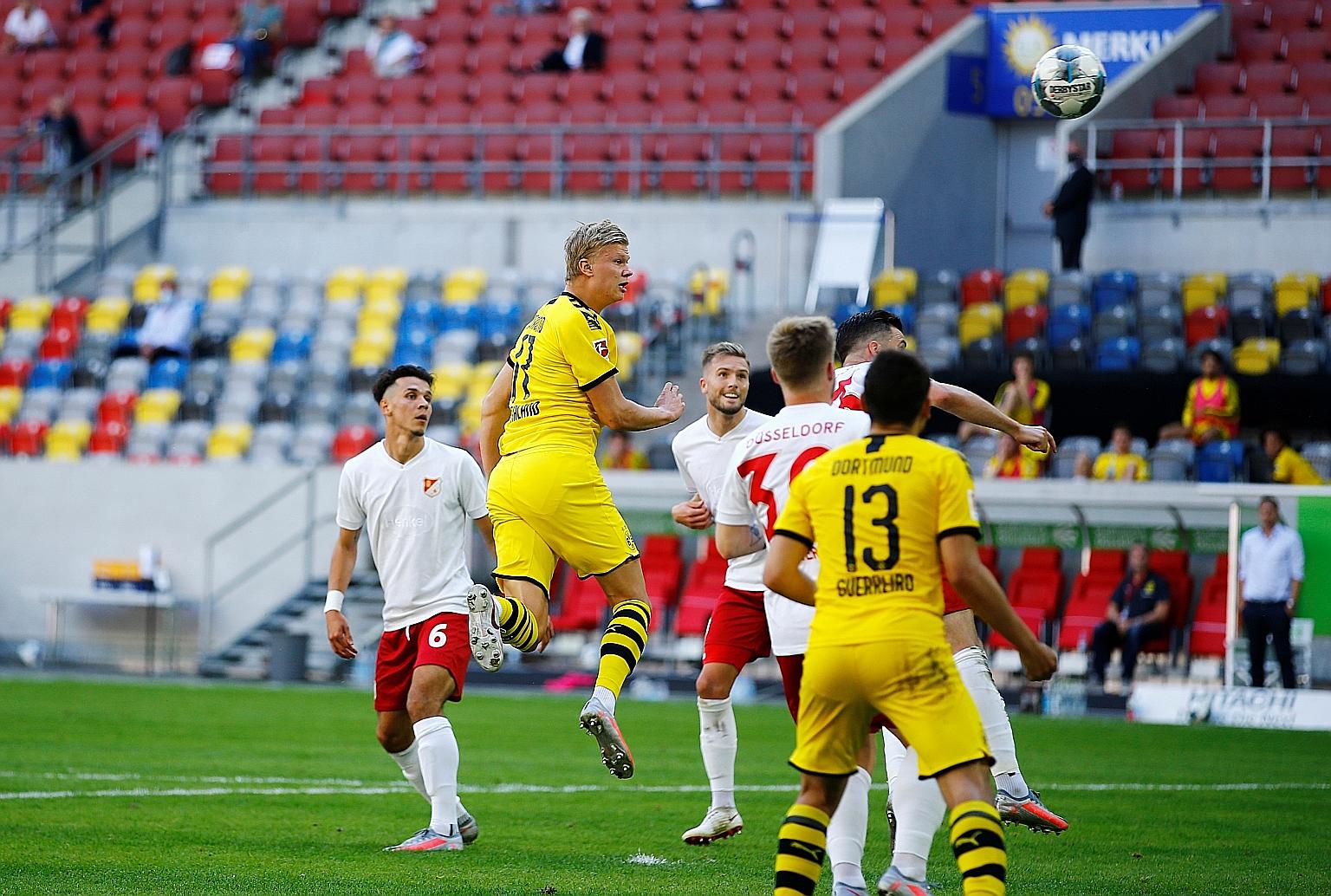 Substitute Erling Braut Haaland's 95th-minute header gave Borussia Dortmund a 1-0 win yesterday at Fortuna Dusseldorf. The Norwegian's dramatic winner kept alive his club's faint hopes of overhauling Bundesliga leaders Bayern Munich, who faced Monche