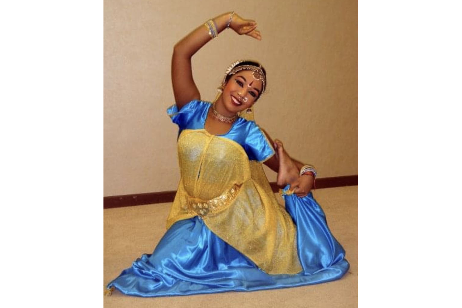 Ms Nishalini Lakchimanathas danced near the top of a towering nine-storey grid filled with performers at the National Day Parade in 2009. PHOTO: COURTESY OF NISHALINI LAKCHIMANATHAS