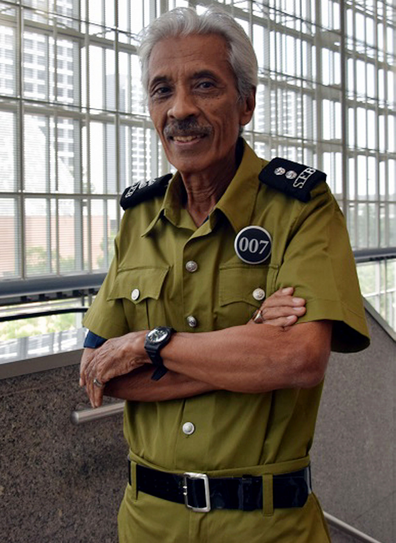 Mr Yunnos Shariff, who was born in the former Geylang Fire Station in Paya Lebar Road into a family of firefighters, also marched in the Golden Jubilee National Day Parade in 2015. PHOTO: HAKIM YUSOF