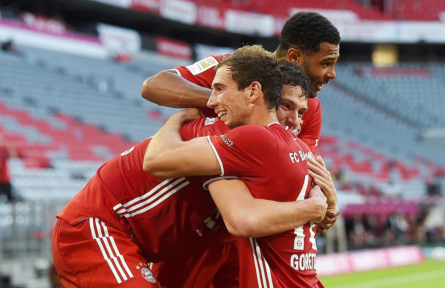 Bayern Munich's Leon Goretzka celebrating with teammates after scoring the second goal in the 86th minute of their 2-1 win over Gladbach.