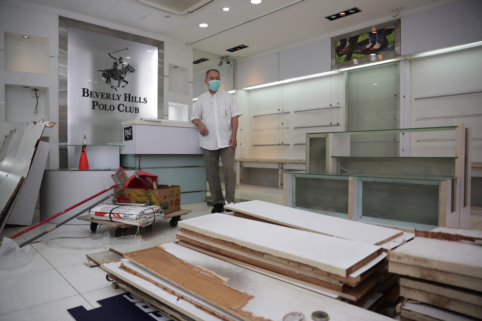 Landlord Wong Hin Yet said he is unable to collect rent as his shop space is unoccupied. The previous tenant vacated in April and the new tenant is unable to take over as the space has not been restored to its original condition. ST PHOTO: GIN TAY