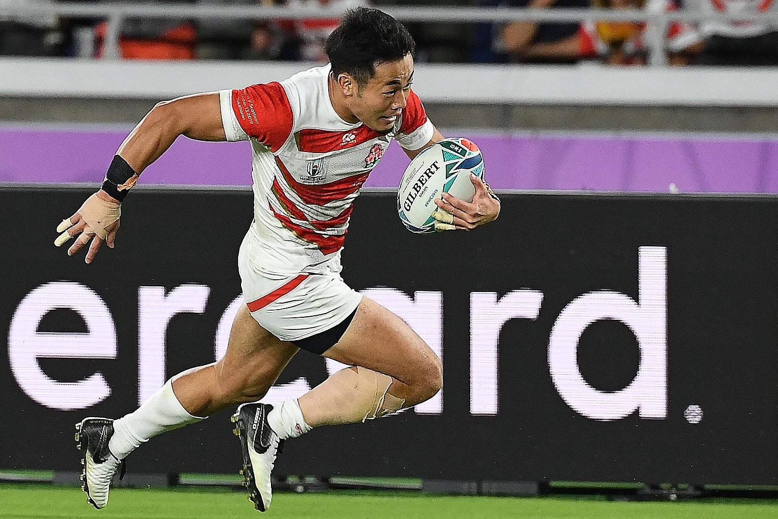 Kenki Fukuoka surging to score one of his four tries at last year's Rugby World Cup. He has pulled out of Japan's sevens squad for next year's Olympics to focus on his medical studies. PHOTO: AGENCE FRANCE-PRESSE