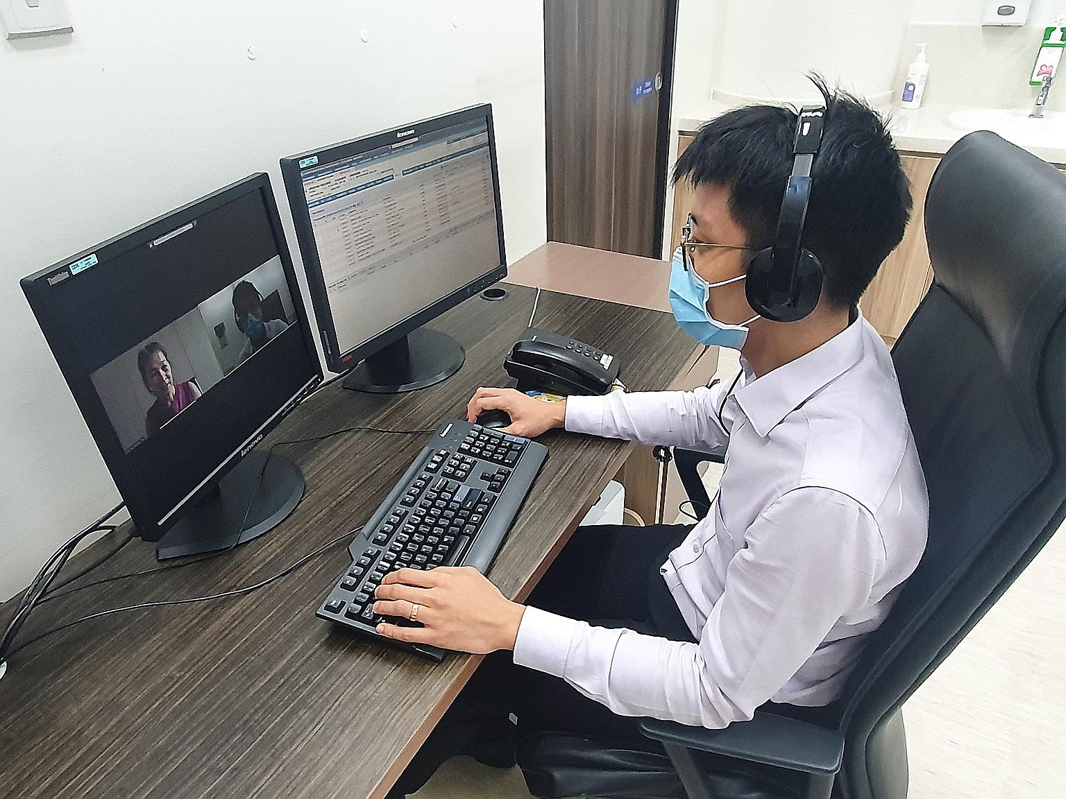 A doctor conducting a teleconsultation session at one of NHGP's polyclinics. PHOTO: NATIONAL HEALTHCARE GROUP POLYCLINICS