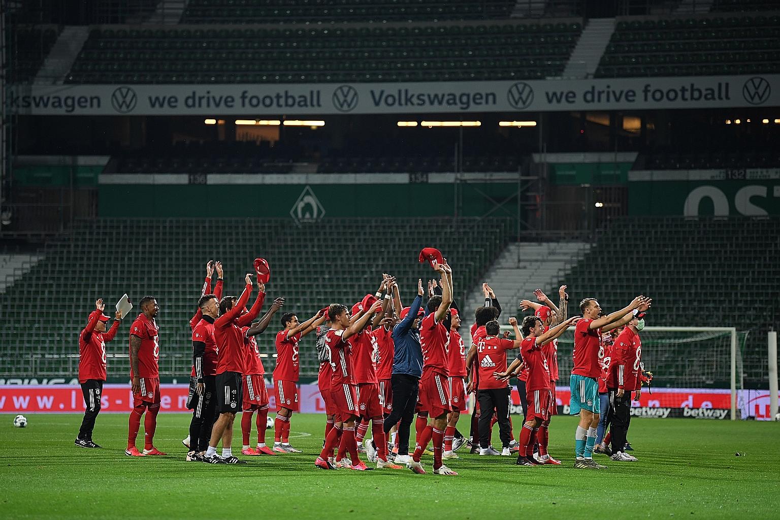 Bayern Munich players celebrating on Tuesday at the Weserstadion in Bremen, Germany, after defeating Werder Bremen to win the Bundesliga title.