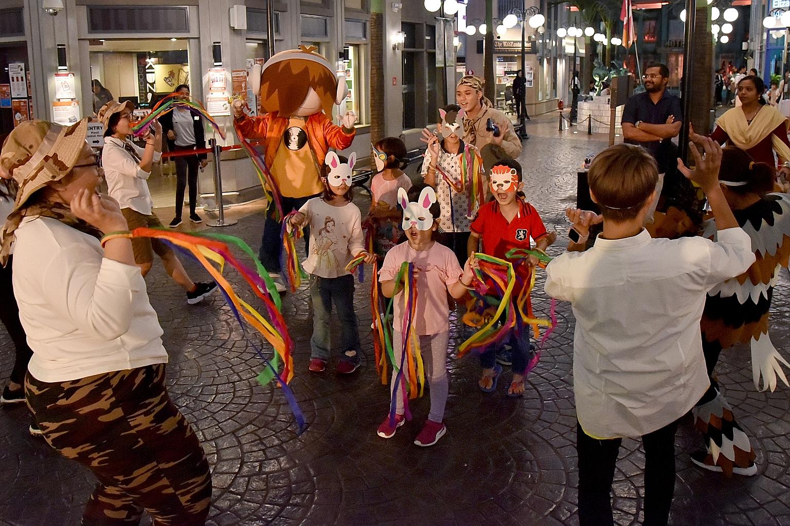 Children in a safari-themed parade last year at Kidzania Singapore. Designed as a small city, it aimed to educate children about different occupations and money management through games and role-play.