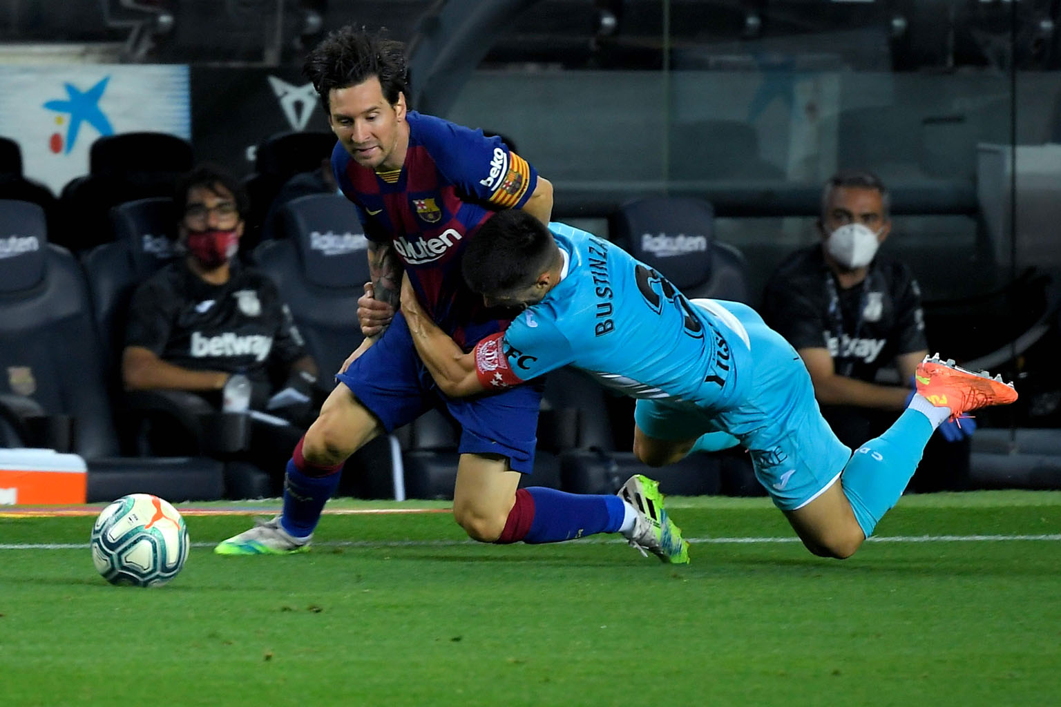 Barcelona's Argentinian star forward Lionel Messi facing a rough tackle by Leganes' Spanish defender Unai Bustinza during Barca's 2-0 La Liga win on Tuesday. The victory, in which Messi scored the second goal, gives the Catalan giants a five-point lead at