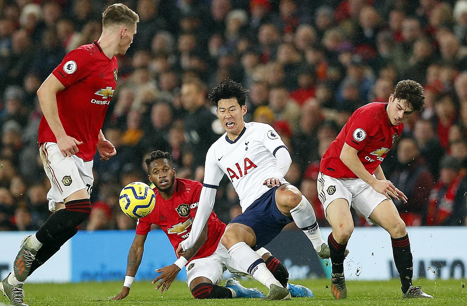 Spurs' Son Heung-min being tackled by Manchester United's Fred, as Scott McTominay and Daniel James close in during the two sides' last Premier League meeting. The super-fit South Korean could be even more of a handful today, after his tough three-we