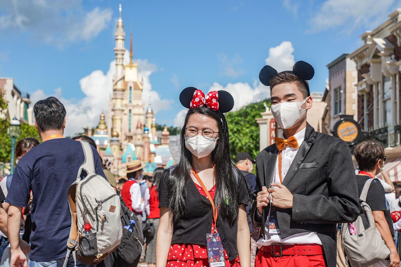 Visitors to Disneyland in Hong Kong yesterday found themselves adding masks to their Minnie Mouse and Mickey Mouse costumes to ward off the coronavirus. Hong Kong's loss-making Disneyland theme park reopened yesterday to a limited number of local vis