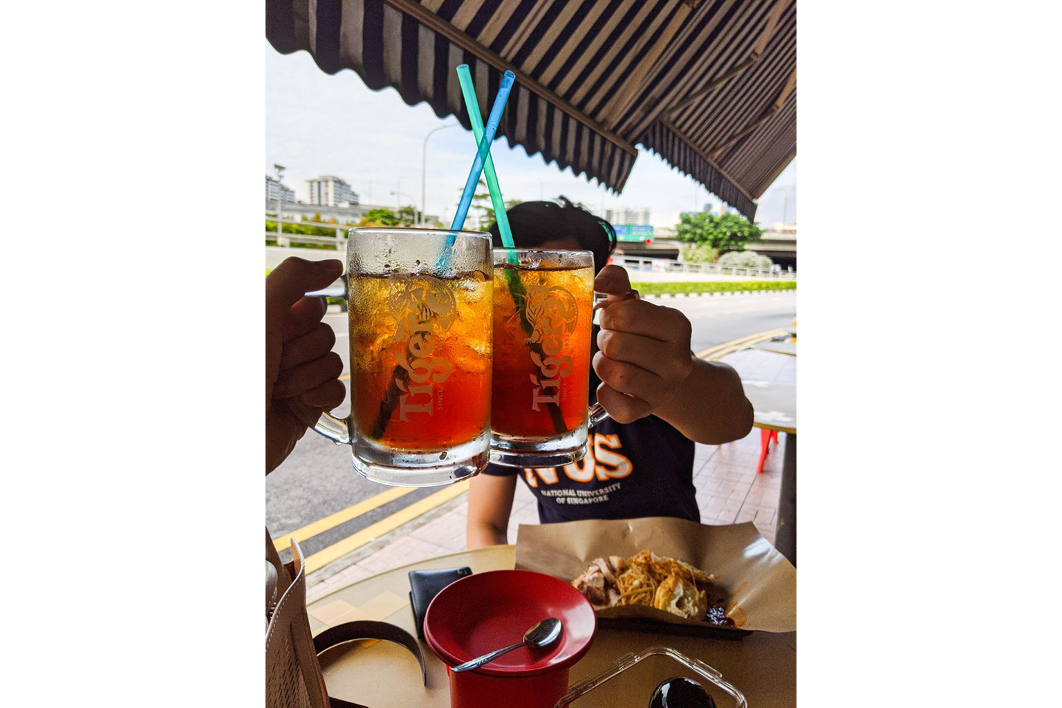 Mr Robert Lim and Ms Beth Ng enjoying their first meal together in person on June 19 when phase two started. The pair became a couple online and had not met each other in person before that day.