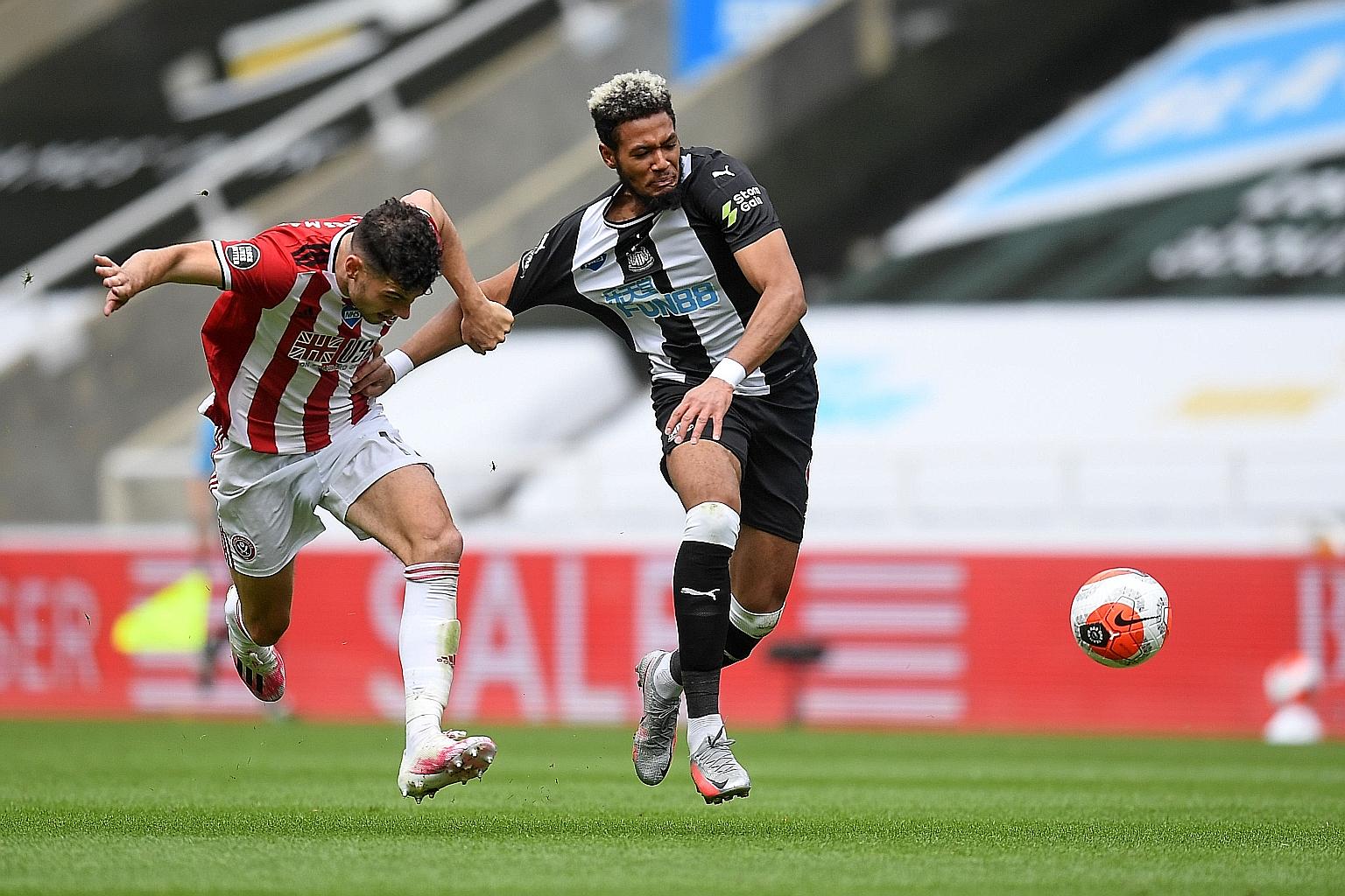 Sheffield's Irish defender John Egan fouling Newcastle's Brazilian striker Joelinton in their game yesterday, resulting in a second yellow card. The floodgates opened soon after at St James' Park, with the hosts running out 3-0 winners, as Joelinton 