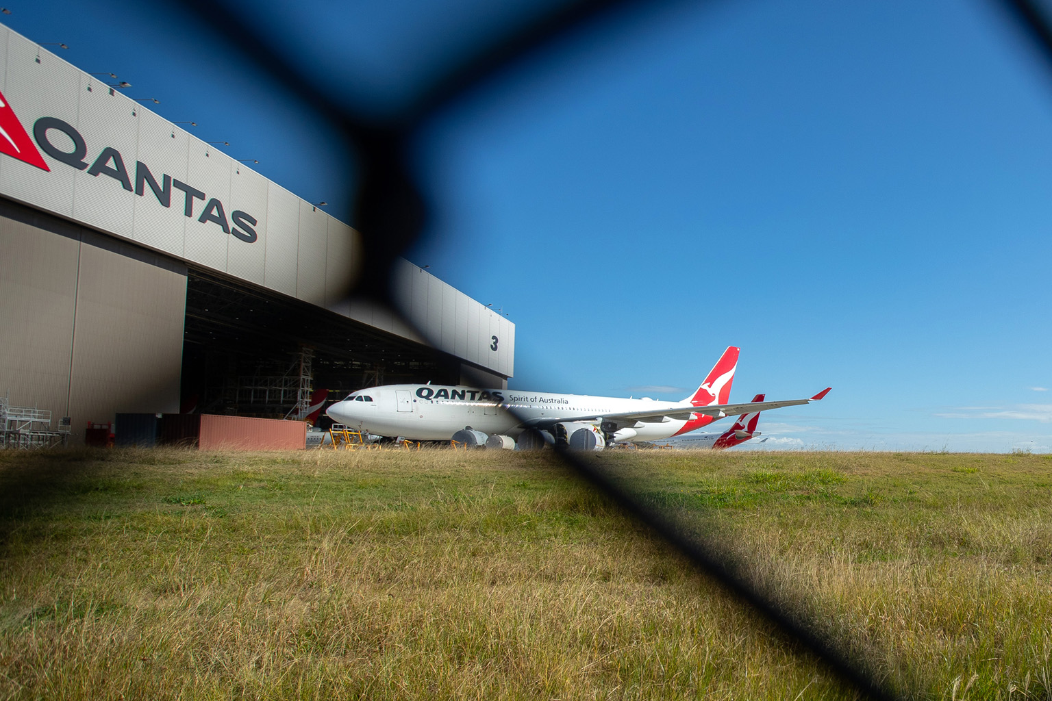 Grounded Qantas Airways aircraft outside a hangar at Brisbane Airport in Queensland, Australia, on June 9. Jetstar and its parent liner Qantas plan to boost their domestic capacity to 15 per cent of pre-pandemic capacity by the end of the month, up f