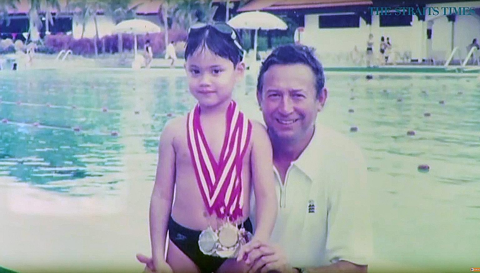 A young Joseph Schooling and his father Colin after a swimming meet in Singapore. With the support of his parents, the boy chased his dreams and made Olympic history. ST FILE PHOTO
