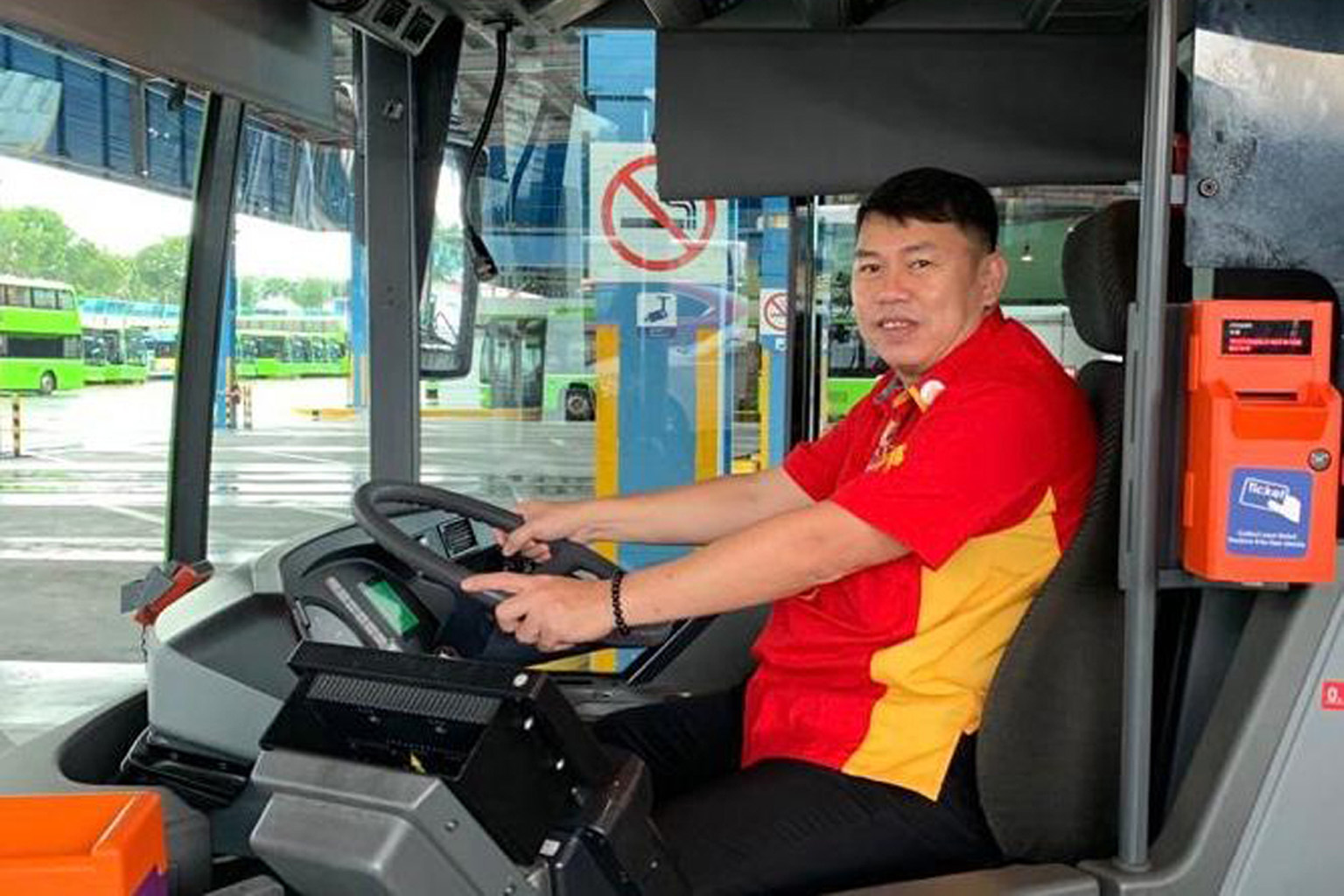 Mr Poh Kian Teck, 50, is among 90 Singaporean taxi and private-hire car drivers to have received training to become bus captains since the beginning of this year.