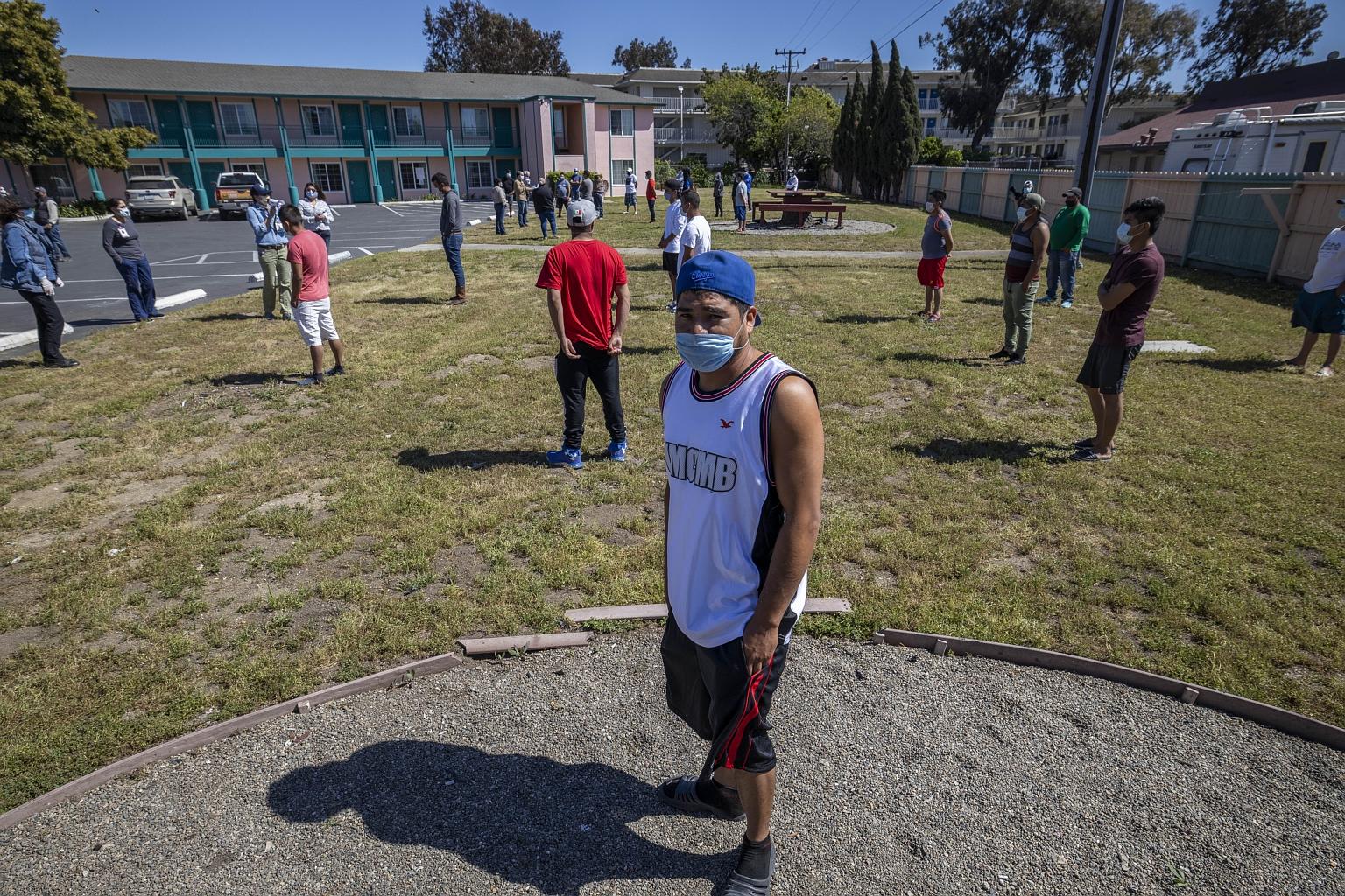 Holders of H-2A visas such as this group are exempt from the new immigration rules in the US. PHOTO: AGENCE FRANCE-PRESSE