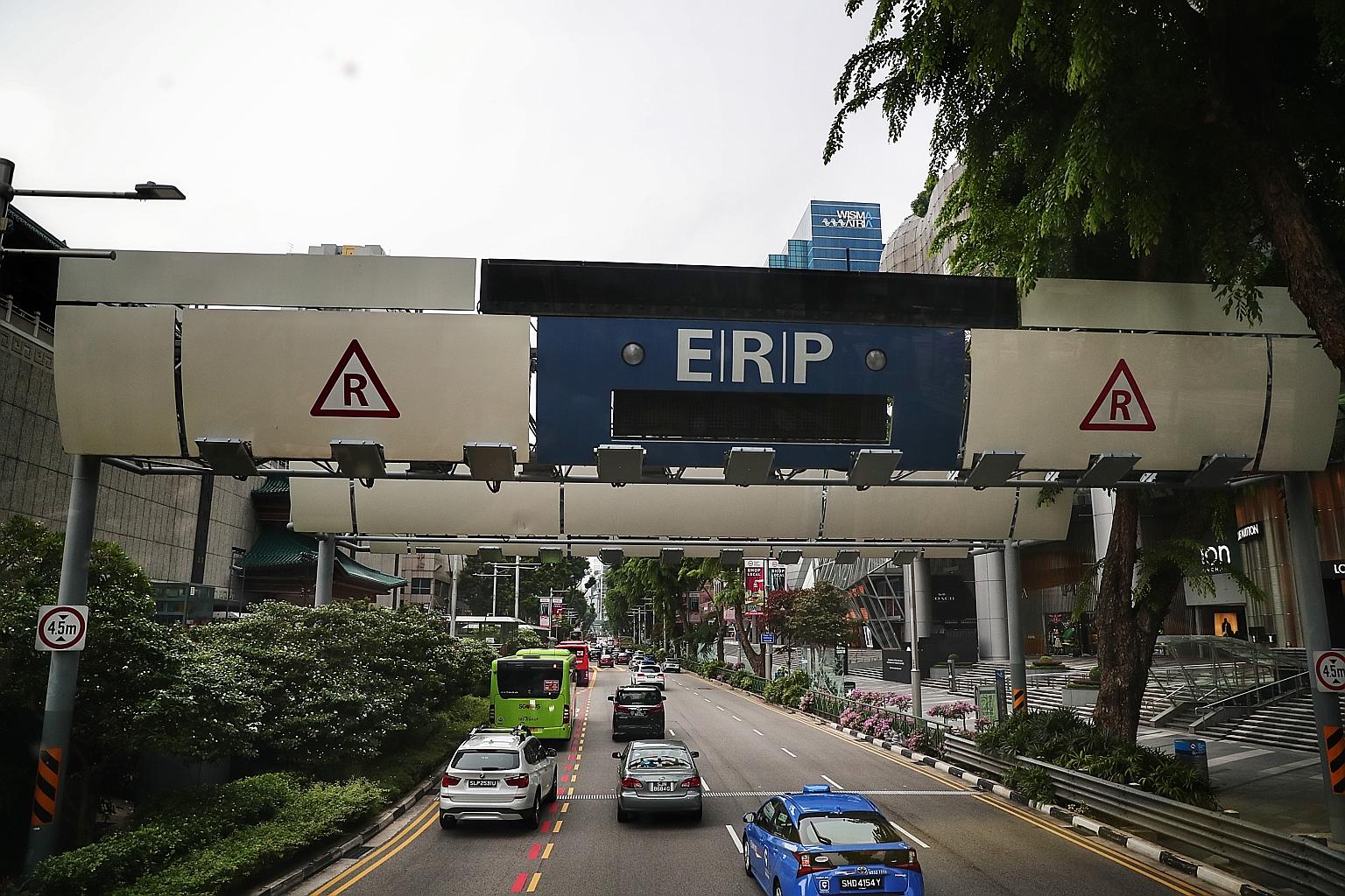 Overall inflation was minus 0.8 per cent last month, mainly due to a larger decline in private transport costs, attributed to cheaper cars and petrol and the continued suspension of Electronic Road Pricing charges. ST PHOTO: KELVIN CHNG