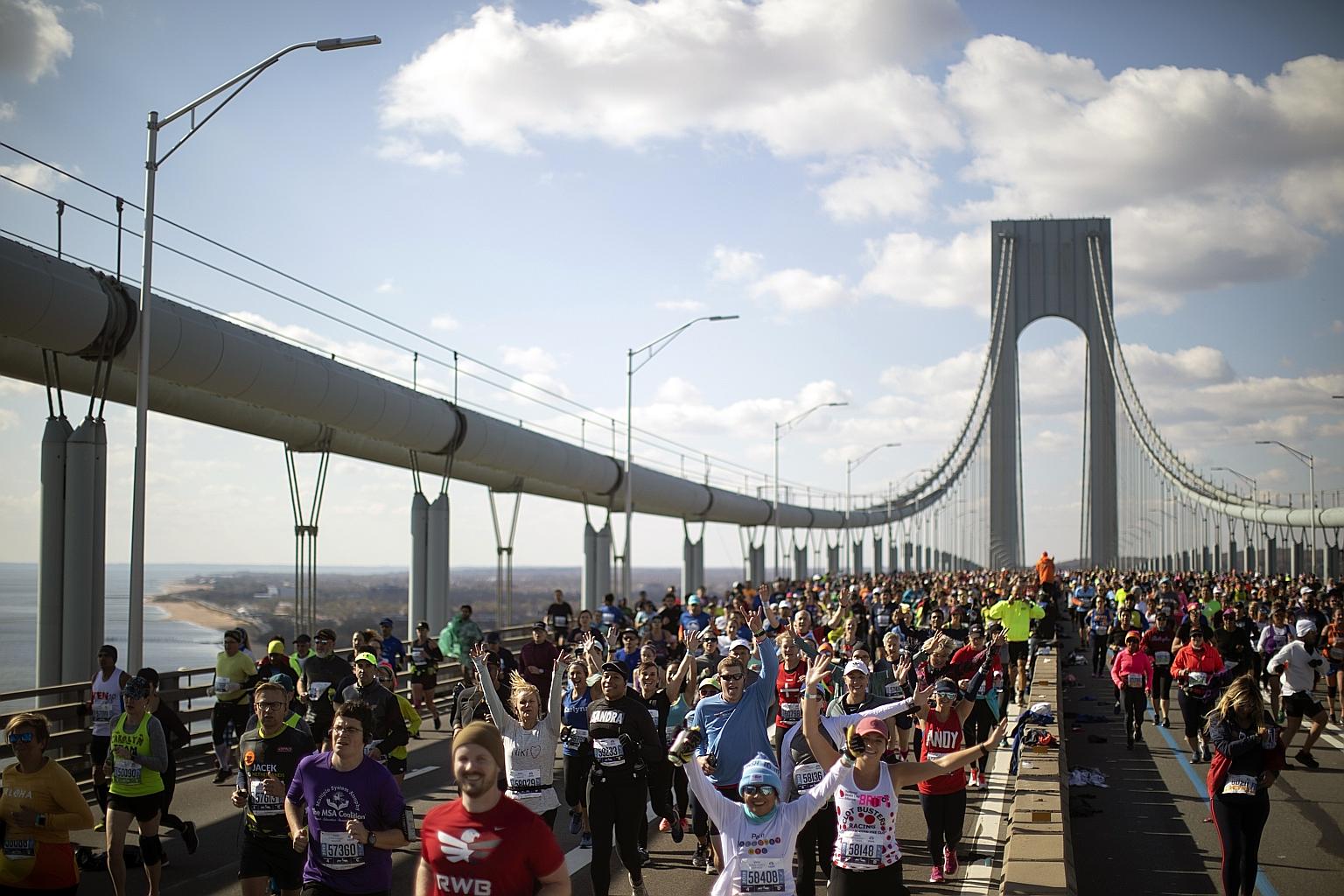 Runners crossing the iconic Verrazzano-Narrows Bridge during last year's New York City Marathon. The world's largest marathon was cancelled due to concerns about holding the race while coronavirus infection remains a risk in the city and elsewhere. P
