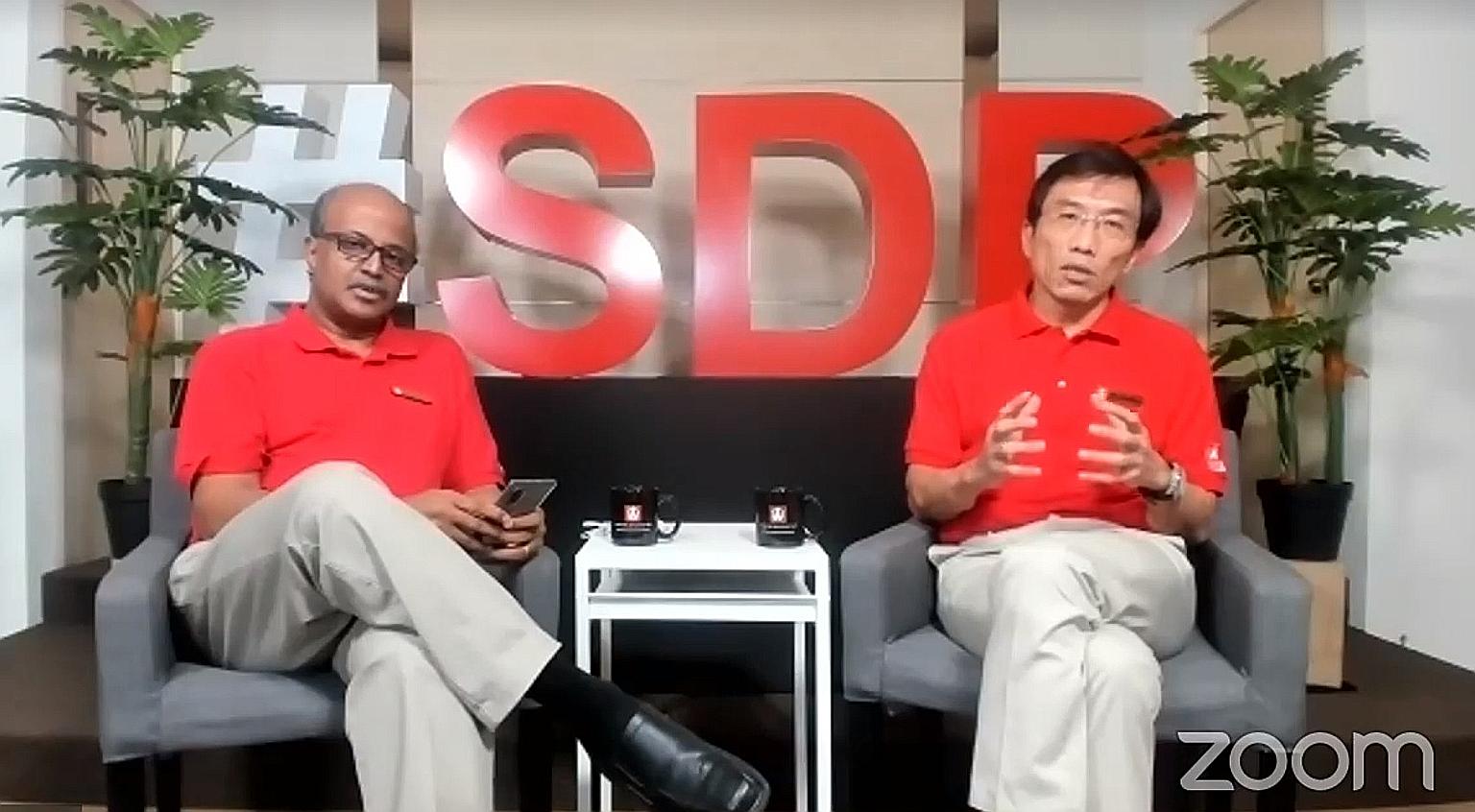 Singapore Democratic Party chairman Paul Tambyah and secretary-general Chee Soon Juan in an online session with the media yesterday. Dr Chee said the meeting was to talk about issues that affect Singaporeans "front and centre".
