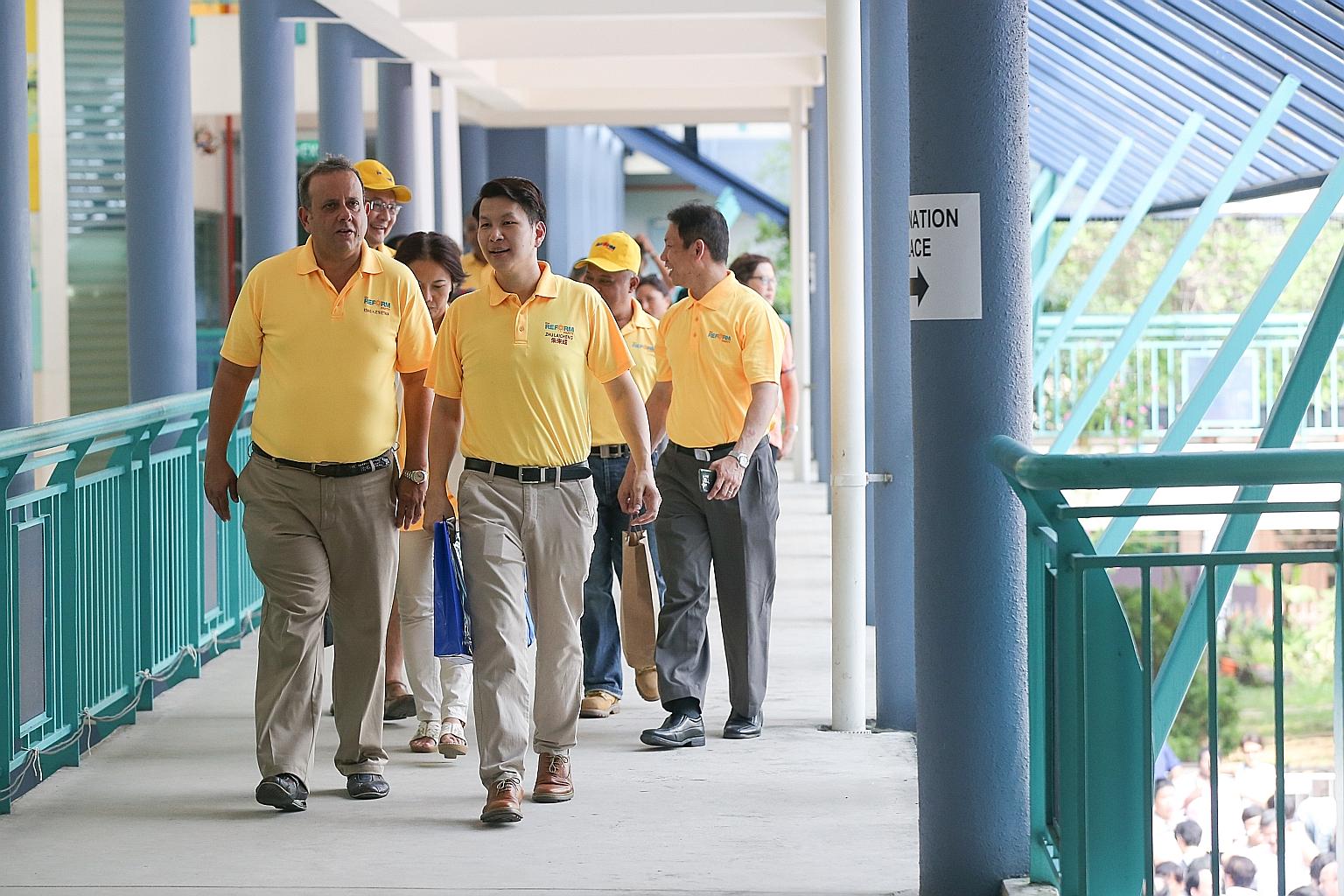 Mr Kenneth Jeyaretnam (left) with his Reform Party's team for West Coast GRC during the 2015 General Election.
