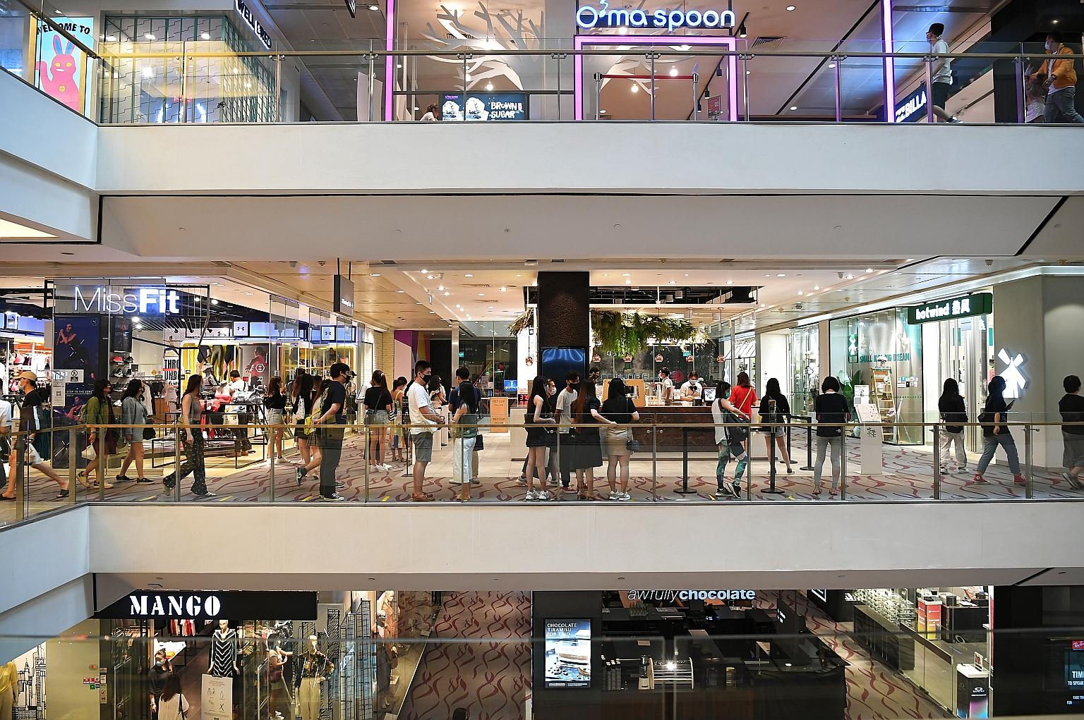 People at 313@somerset mall yesterday. A majority of the employees whose monthly salaries were affected come from sectors severely impacted by Covid-19, such as the retail trade. Most had their salaries cut by up to 25 per cent as a result of cost-sa