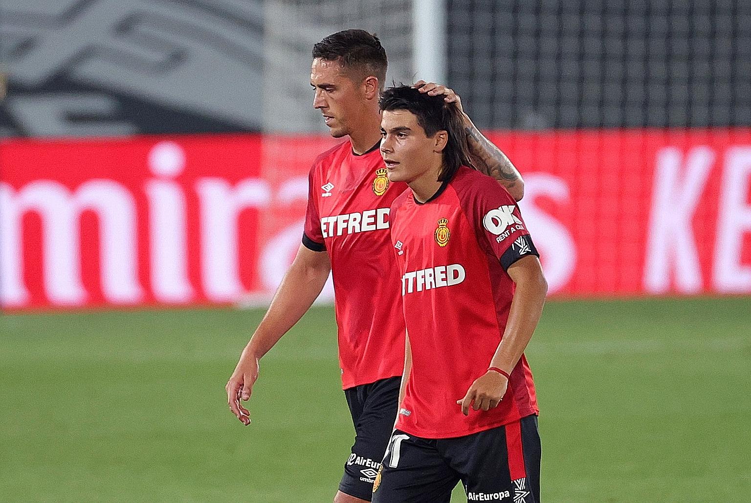 Mallorca's Luka Romero (right), walking off the pitch with Antonio Raillo after their 2-0 defeat by Real Madrid, is the youngest player to ever feature in La Liga. The 15-year-old Mexican has been likened to Argentina's Lionel Messi.