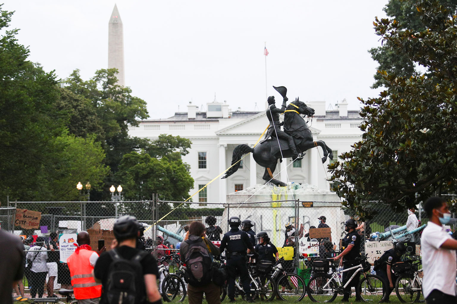 Officers from the Washington Metropolitan Police Department at Lafayette Square near the White House on Monday as protesters tried to pull down a statue of former US president Andrew Jackson. Black Lives Matter demonstrators in the United States have