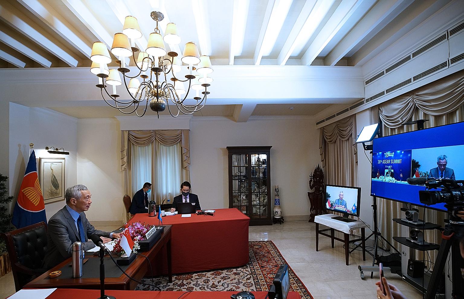 Prime Minister Lee Hsien Loong addressing regional leaders at the 36th Asean Summit yesterday. The summit, which was postponed from April due to the pandemic, took place via videoconference. Asean foreign ministers, including Singapore's Dr Vivian Ba