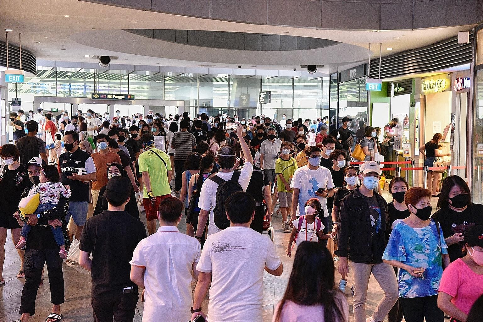 Shoppers at Waterway Point in Punggol last weekend, after Singapore moved into phase two of its reopening in the post-circuit breaker period. The Covid-19 pandemic shows no signs of slowing down across the world, with the number of cases approaching 