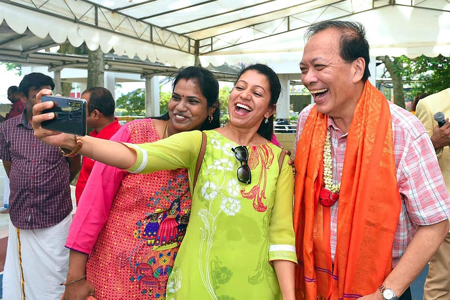 A photo from Mr Charles Chong's Facebook page showing him interacting with residents. In 2011, Mr Chong won Joo Chiat SMC with 51.02 per cent of the votes against Mr Yee Jenn Jong of the Workers' Party (WP). In 2015, he wrested Punggol East back from