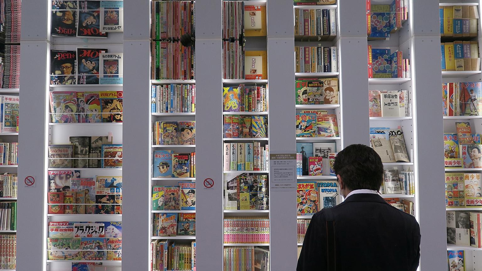A wall of vintage manga comics and magazines at the Tokiwa-so manga museum in Tokyo, launched last Saturday. It honours famous manga creators such as Osamu Tezuka (Astro Boy) and Fujiko Fujio (Doraemon).