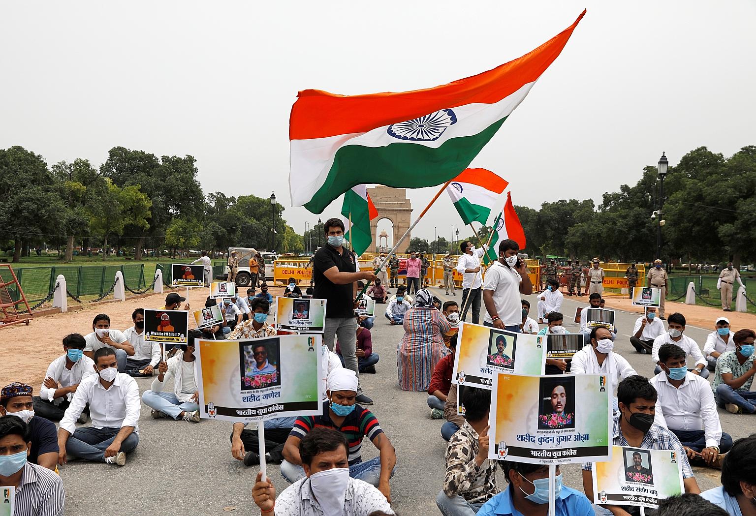 Supporters of India's main opposition Congress party in New Delhi last Friday paying tribute to Indian soldiers killed in the border clash with Chinese troops. The violent clash has seen tensions impact bilateral economic ties.
