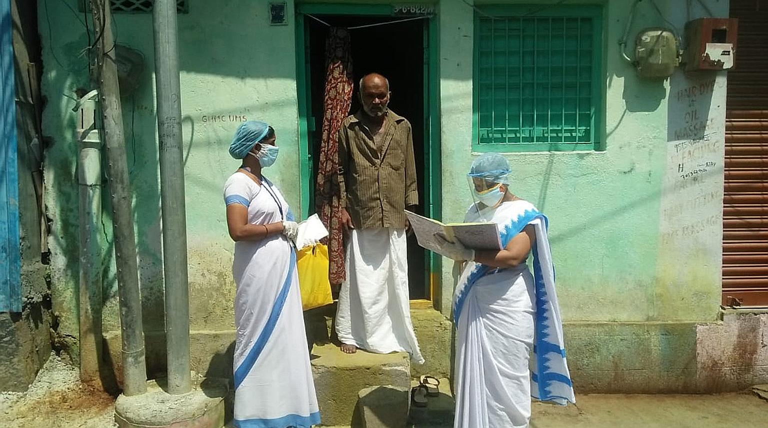 India's women community health workers, like these in Hyderabad (above), are poorly paid and often not given proper protective gear. They perform crucial tasks, such as helping to treat diarrhoea, fever and tuberculosis. With the pandemic, they are a