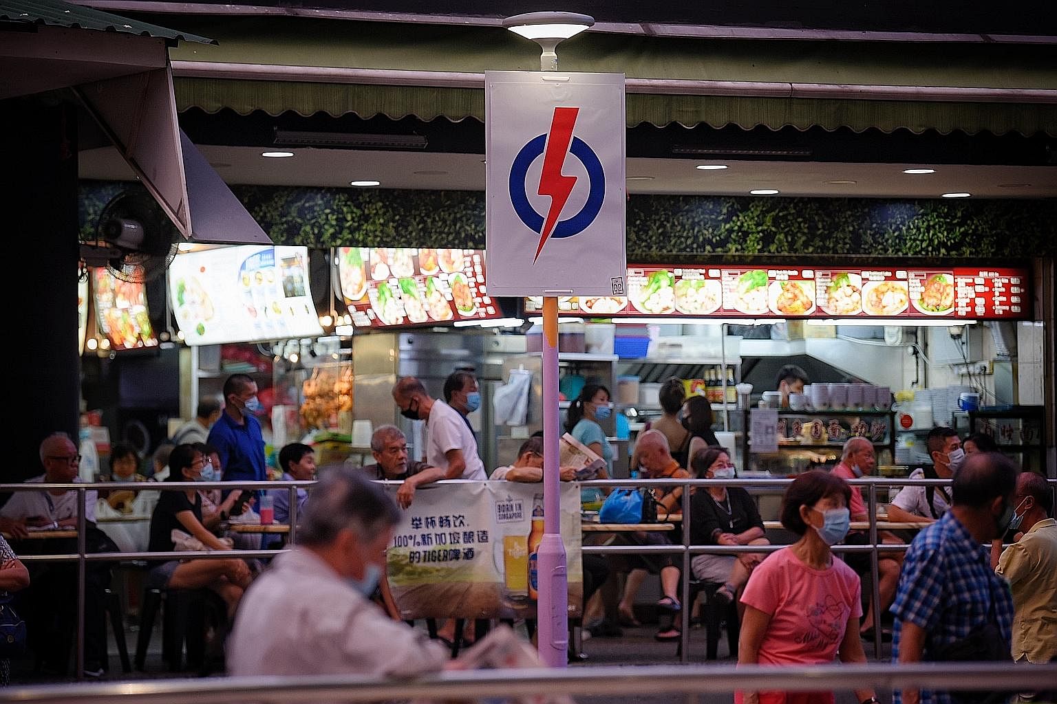A PAP logo outside a coffee shop at Ang Mo Kio Town Centre. Deputy Prime Minister Heng Swee Keat said that the ruling party is seeking a clear mandate to lead Singapore through the storms ahead. ST PHOTO: MARK CHEONG