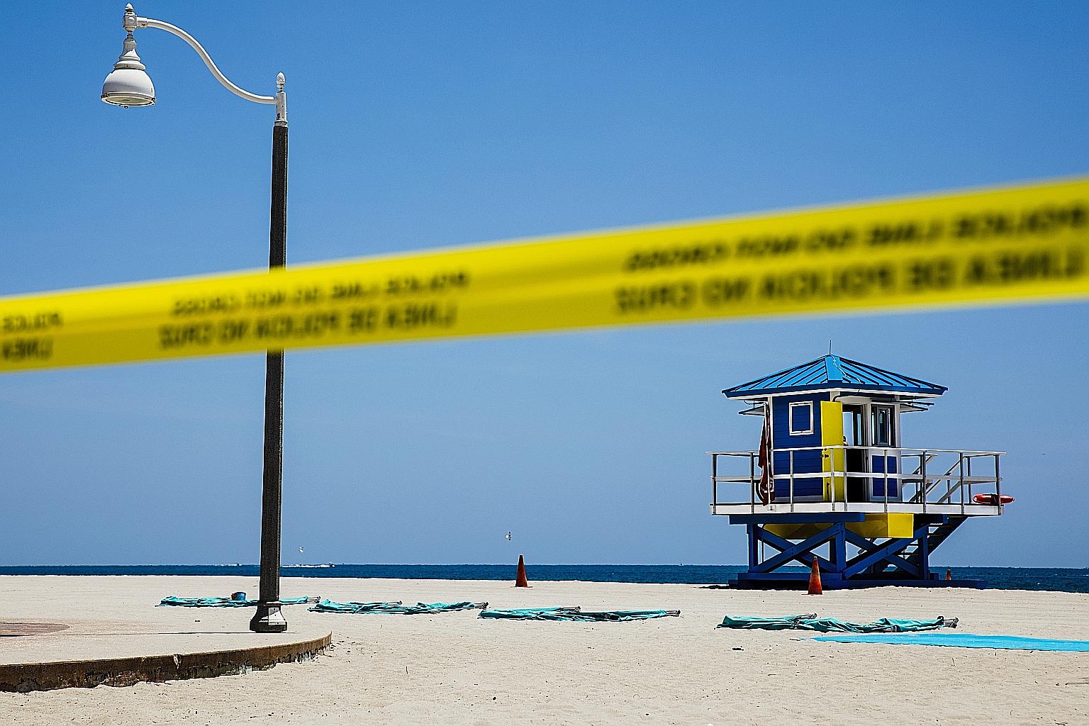 An empty beach in Hollywood, Florida, on Friday. The recent surge of coronavirus infections in the US alarmed public health officials, who urged caution ahead of the Fourth of July holiday weekend.