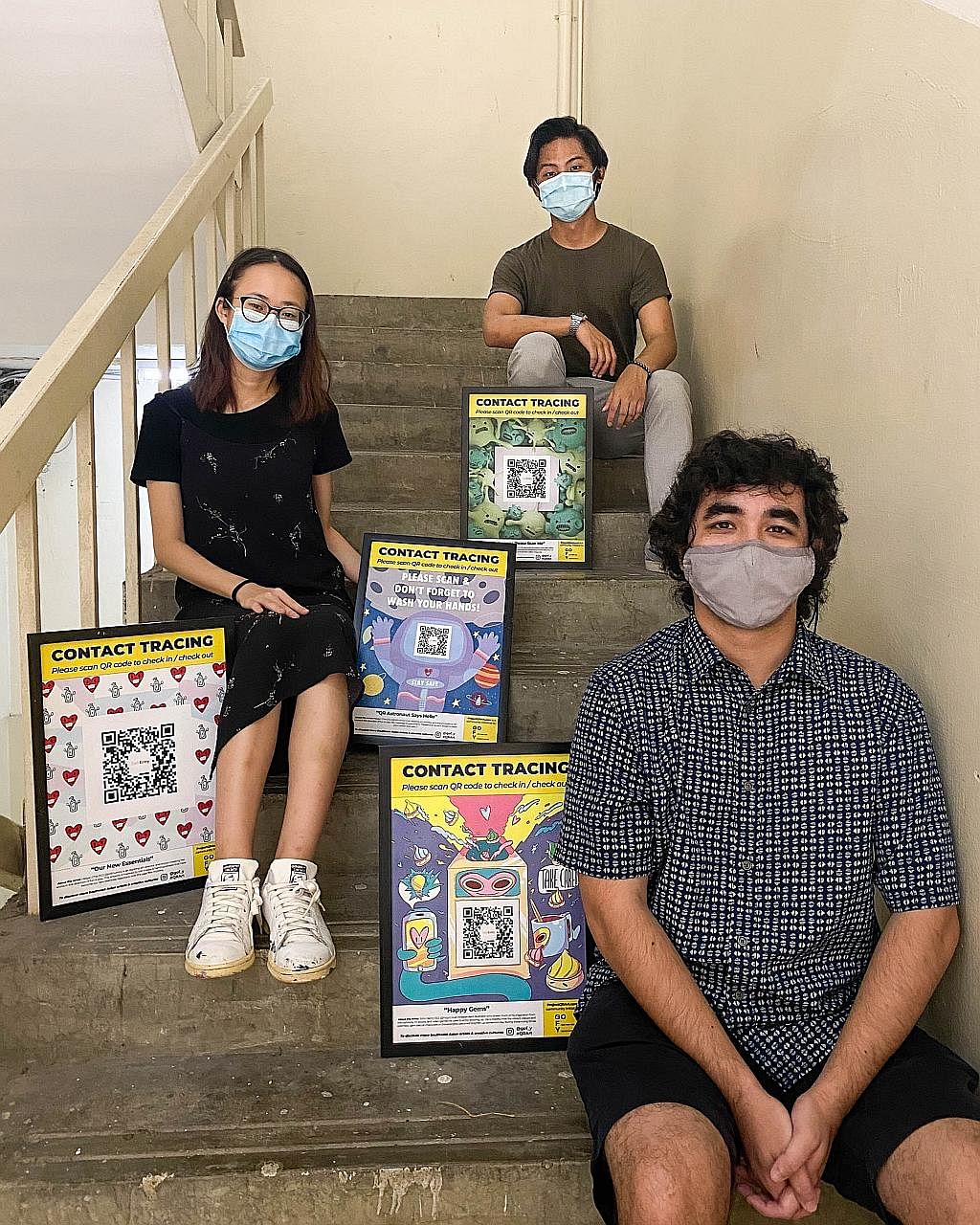Singaporeans John Henry (front), 32, Megan Chia, 20, and Zul Eddy Zain, 24, are among artists who have designed SafeEntry posters that can be downloaded for free under Project #QRArt. Launched by home-grown creative collaborative GOFY, the project ha