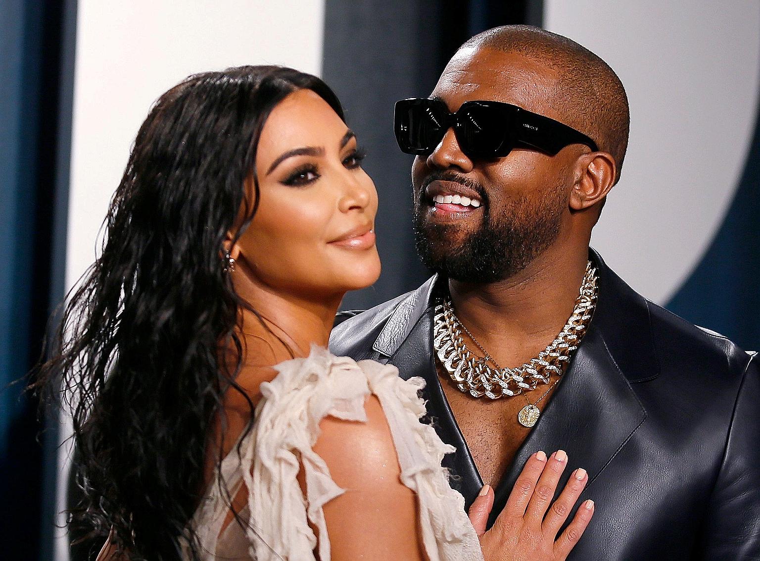 Rapper and fashion designer Kanye West (left) with his wife, reality-television star Kim Kardashian West. He had previously announced plans to run for president without doing so.