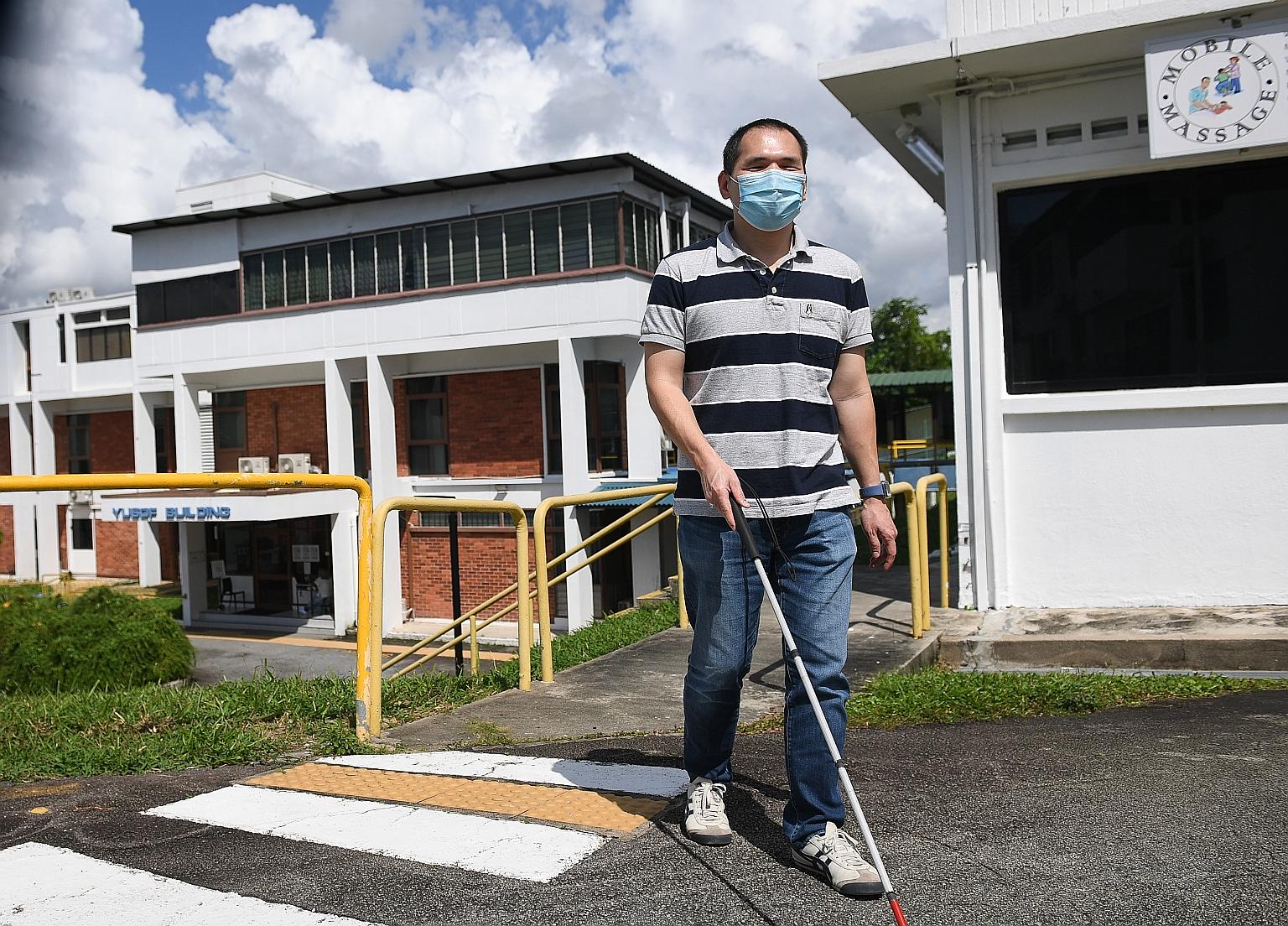 Mr Edwin Khoo, 43, says the stencils will enable him to mark his choice more confidently. ST PHOTO: SHINTARO TAY