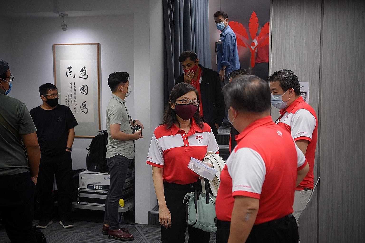 Progress Singapore Party's West Coast GRC candidate Hazel Poa arriving at the party headquarters early this morning. PSP's A team lost the contest in the GRC with 48.31 per cent of the votes. ST PHOTO: MARK CHEONG