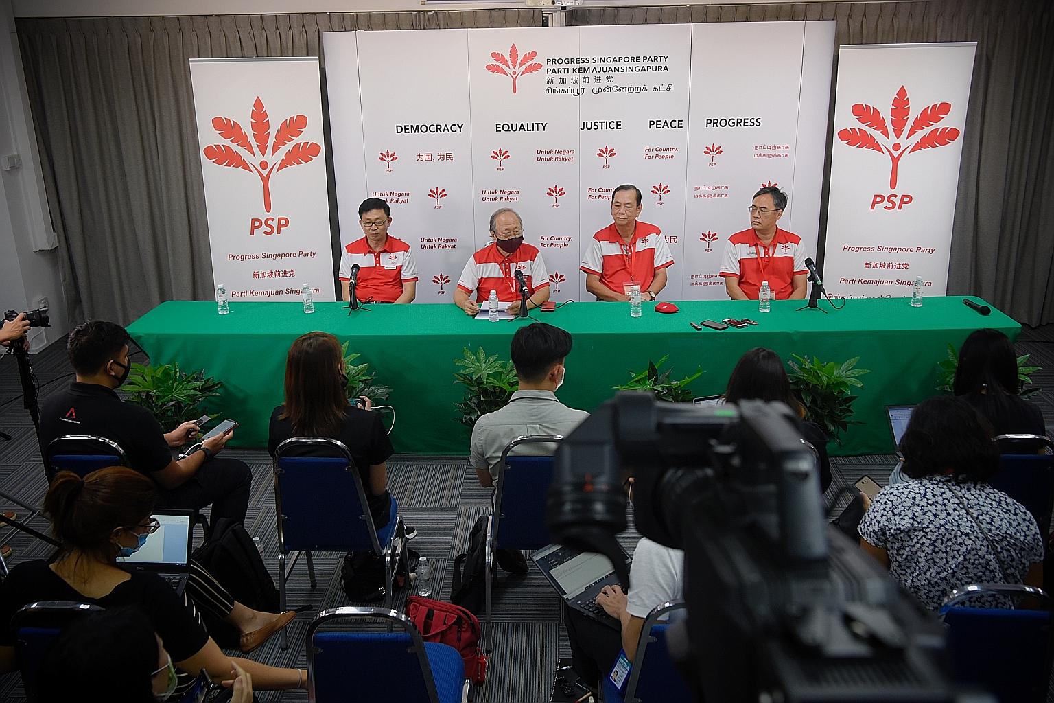 Progress Singapore Party chief Tan Cheng Bock (second from left) and fellow candidates (from right) Michael Chua, Francis Yuen and Damien Tay addressing the media after the election results were announced early this morning. Though the party came clo