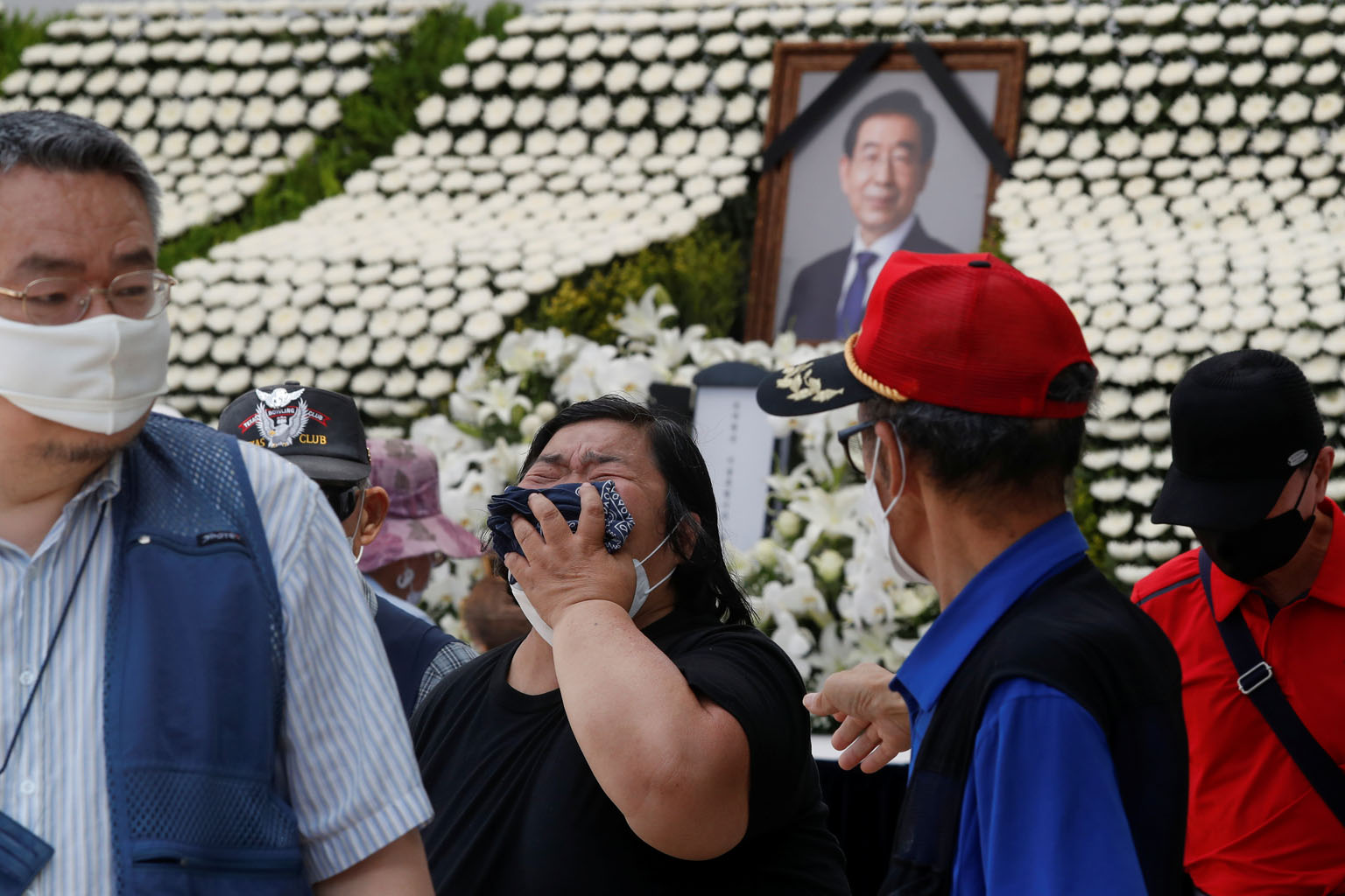 A woman grieving at a memorial altar for the late Seoul mayor Park Won-soon at Seoul City Hall Plaza yesterday. Mr Park's body was found in the woods of Mount Bugak in northern Seoul early on Friday, after he was reported missing the day before. It a