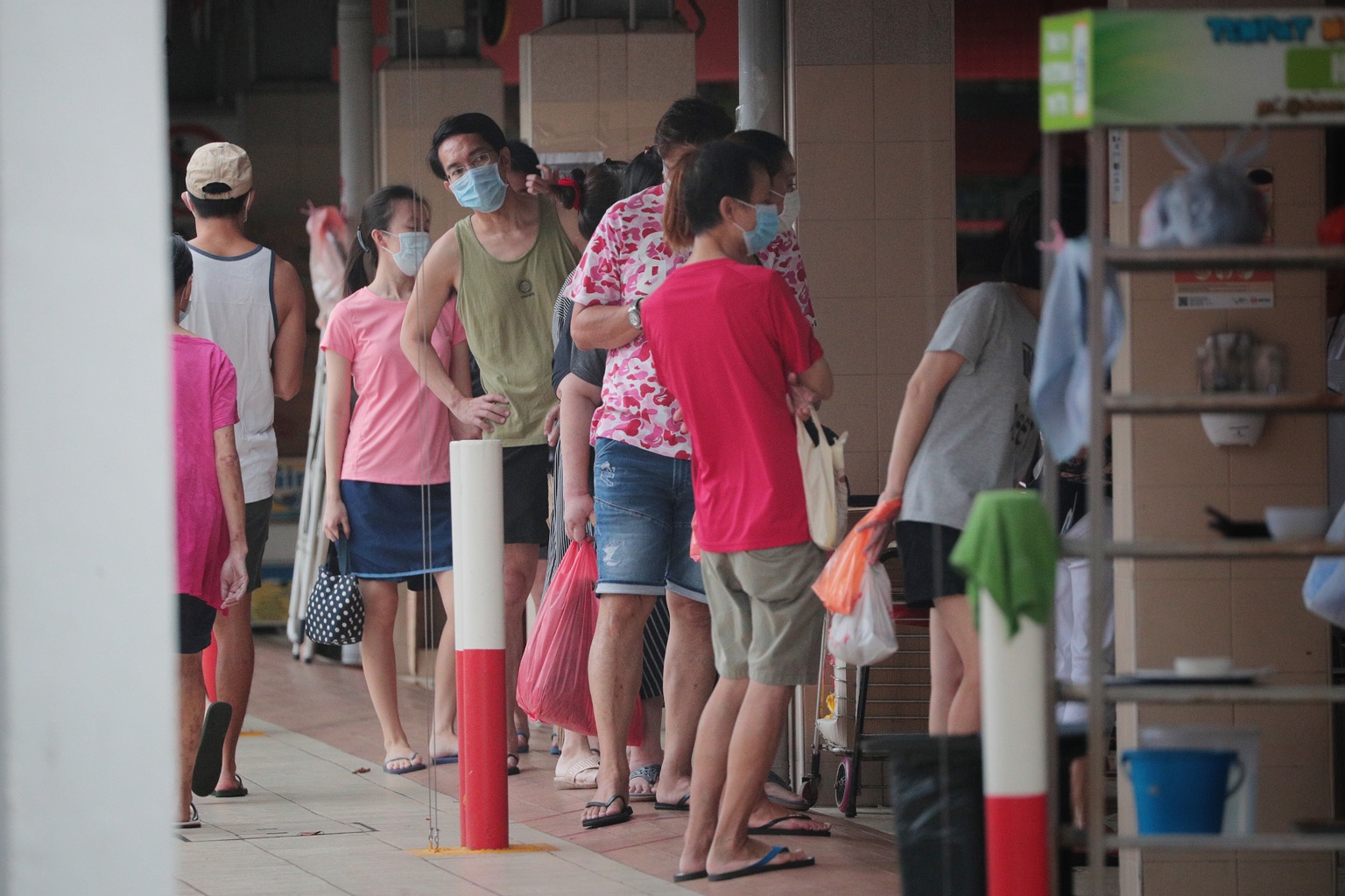 Customers at a hawker centre in Telok Blangah yesterday. The average number of unlinked cases in the community per day has increased to eight in the past week, from five the week before. ST PHOTO: JASON QUAH