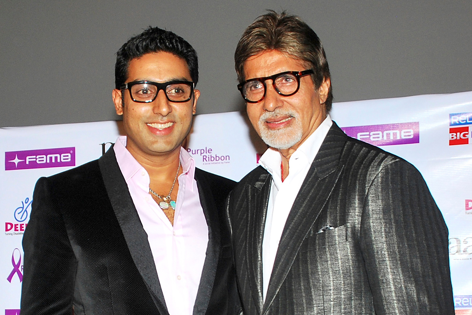 Amitabh Bachchan (right) and his son Abhishek (left) each posted on social media that they had tested positive for the coronavirus. 
