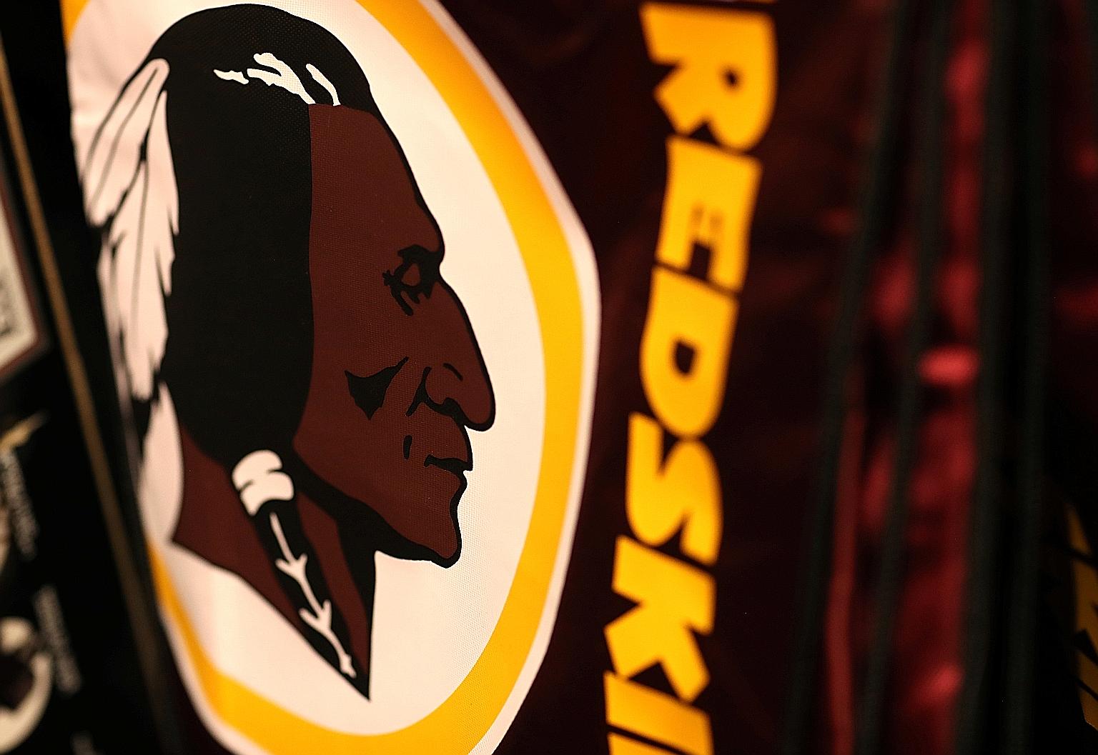 Redskins-branded merchandise on display in a sports store as the Washington NFL team announced the logo and name would no longer be used. PHOTO: REUTERS
