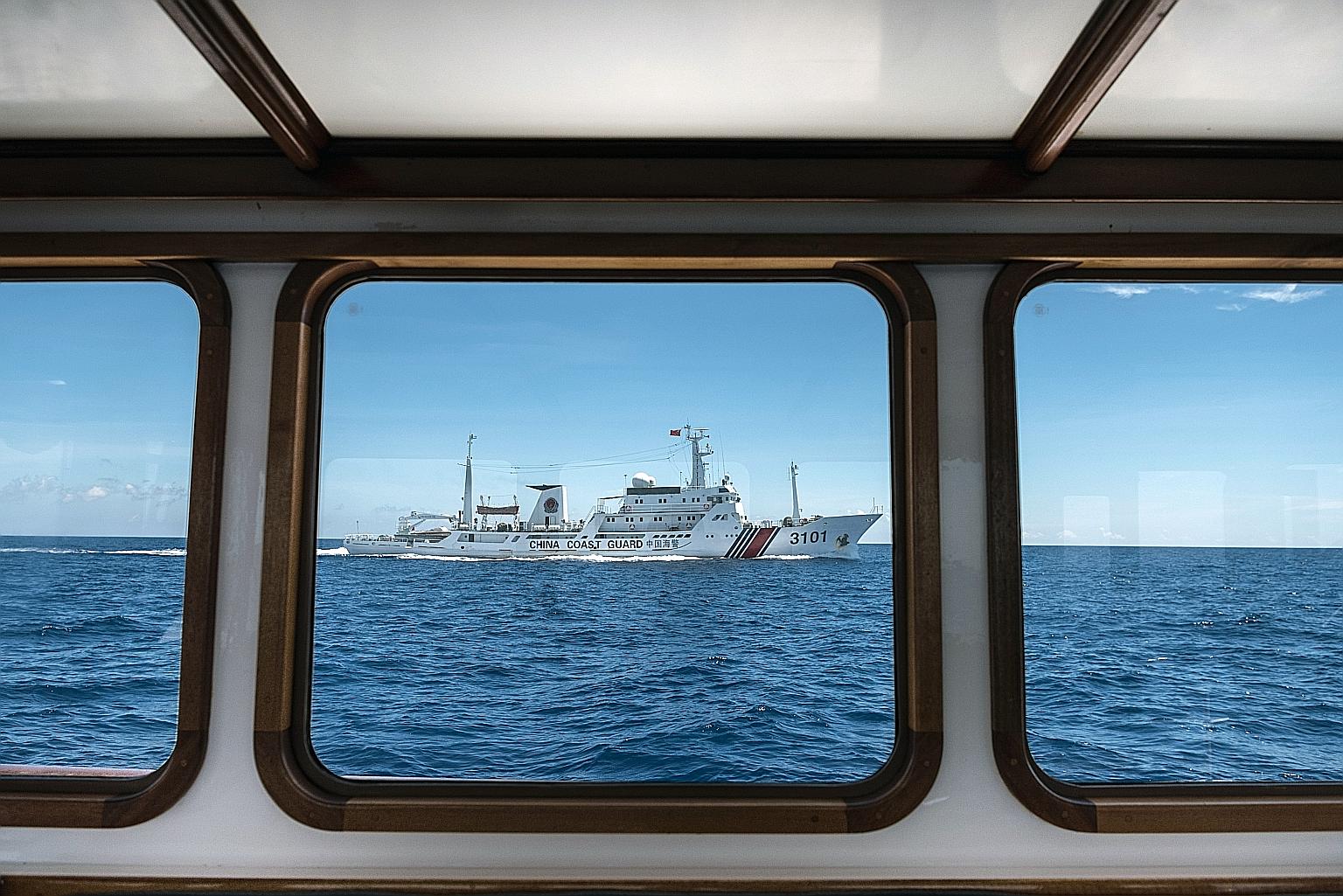 A file photo from 2016 showing a Chinese coast guard ship near Scarborough Shoal, a reef in the South China Sea that is claimed by both China and the Philippines.
